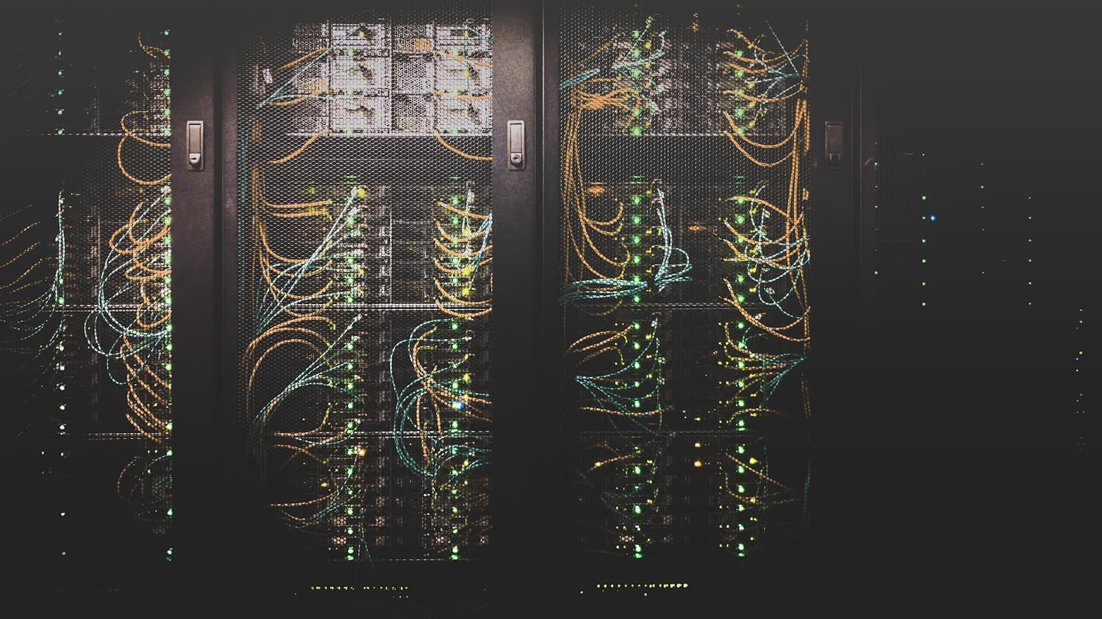 Illuminated data center corridor with server racks, capturing the scale of cloud GPU infrastructure behind managed model inference